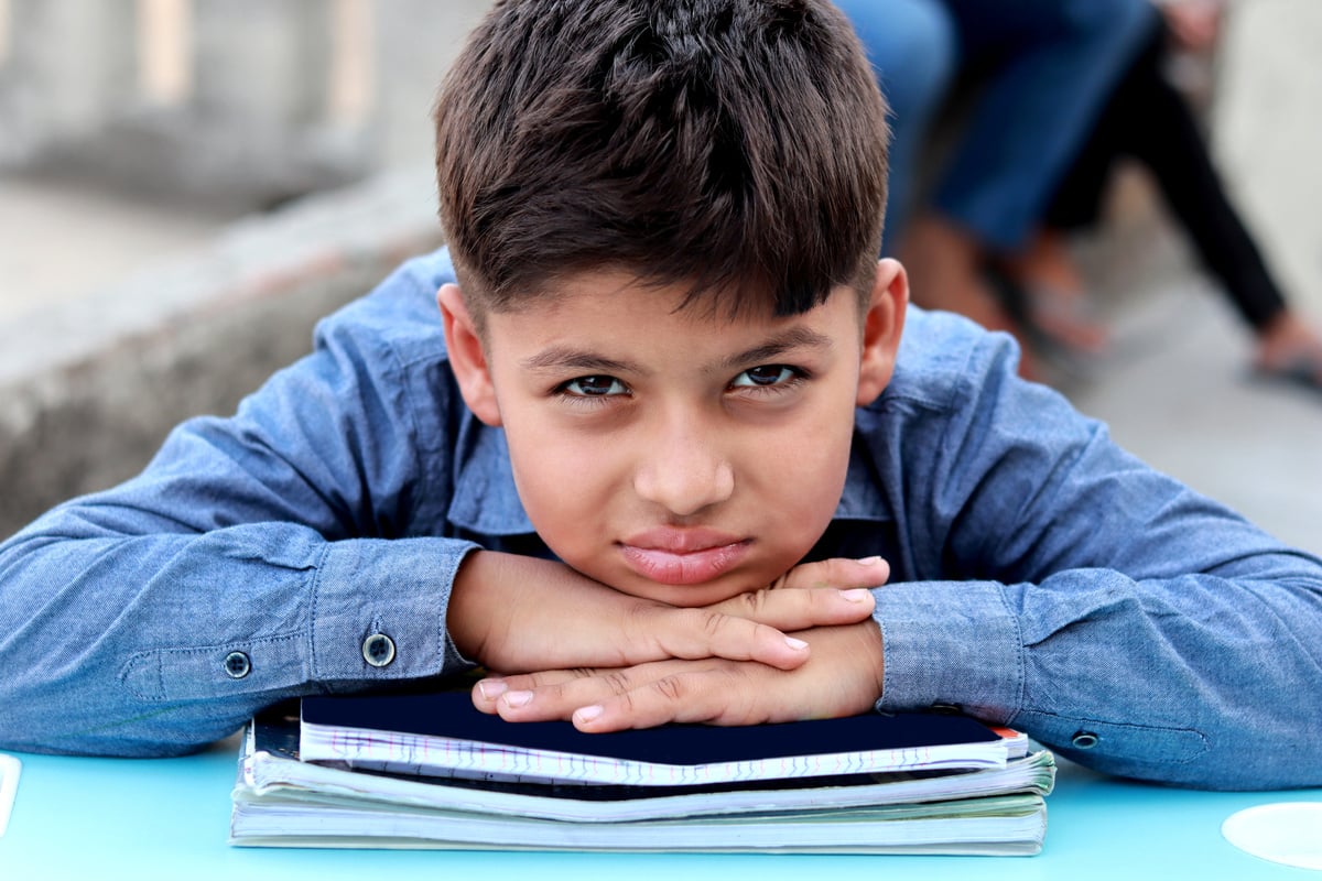 Elementary student with books